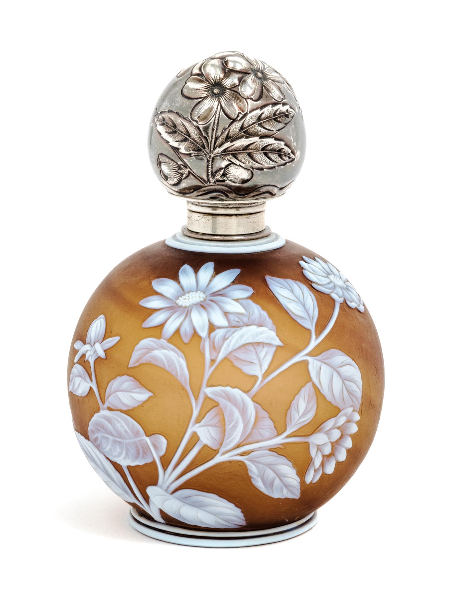 English, LATE 19TH CENTURY, a silver mounted cameo glass perfume bottle, of spherical for with floral and fern decoration