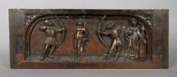 A Continental Carved Panel Depicting the Martyrdom of Saint Sebastian, Height 8 5/8 x width 23 inches.