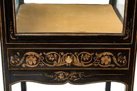 A Pair of Stenciled Black Painted Vitrine Cabinets