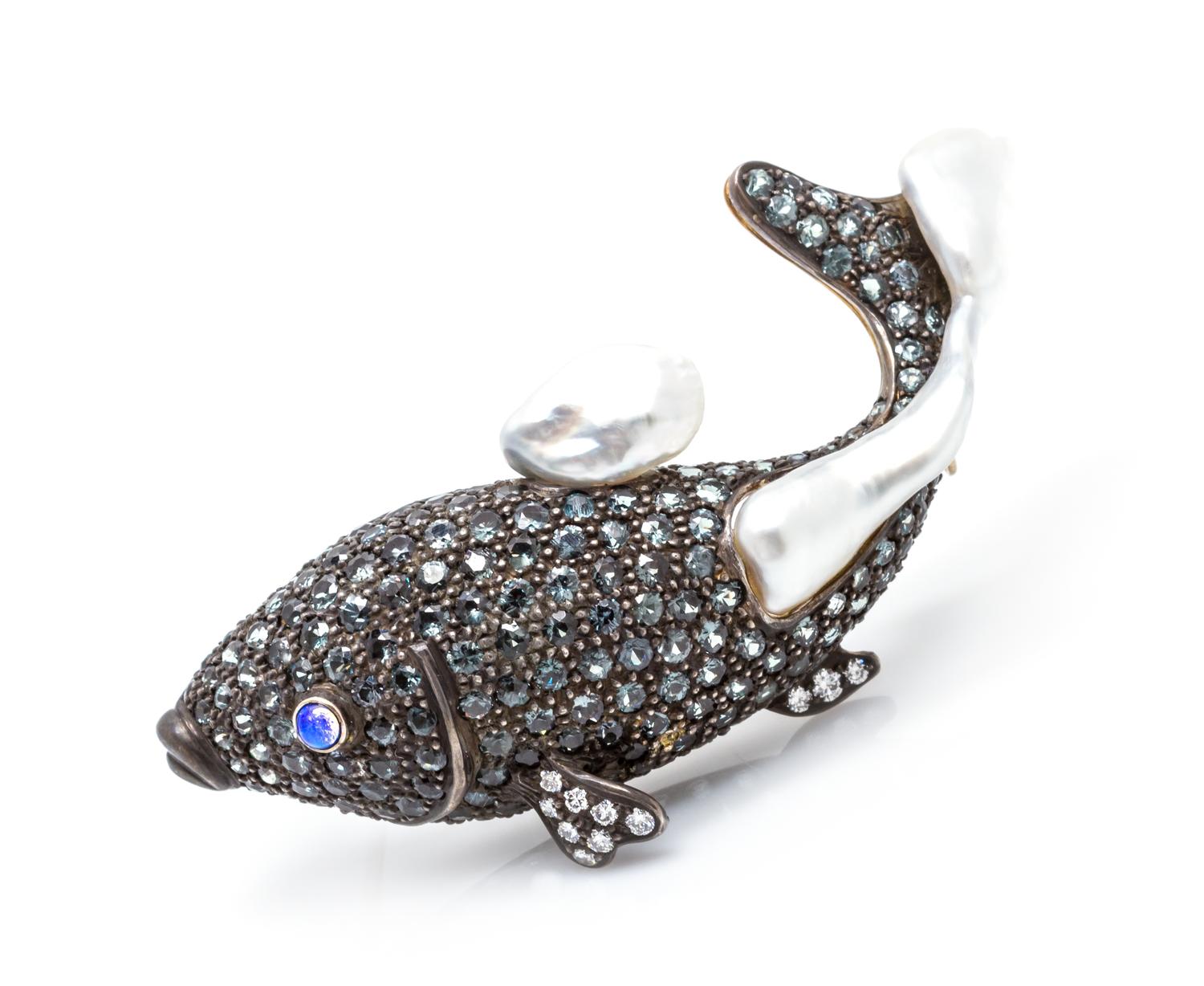 An 18 Karat Gold, Silver, Multi Gem and Cultured Pearl Fish Brooch, 13.80 dwts.