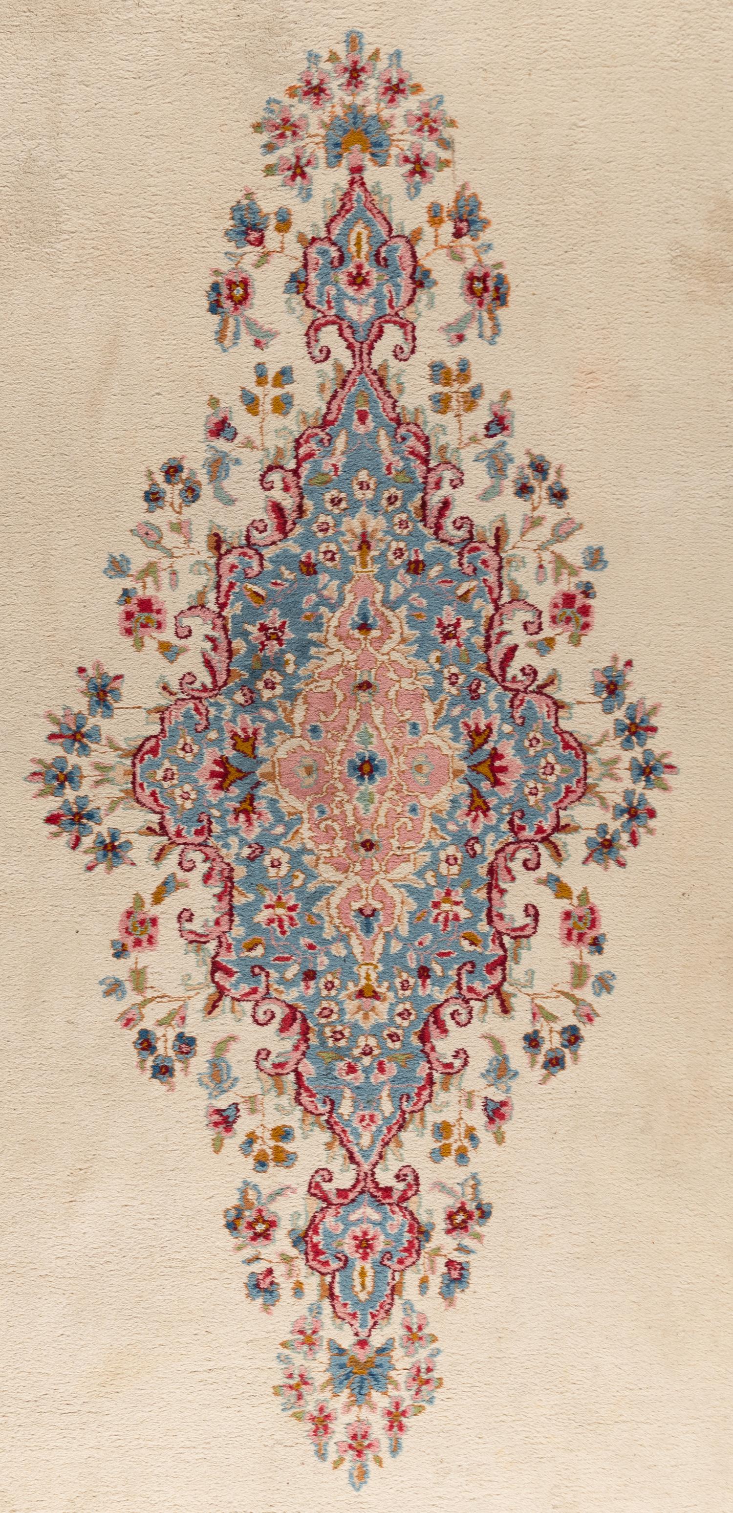 A Kerman Wool Rug