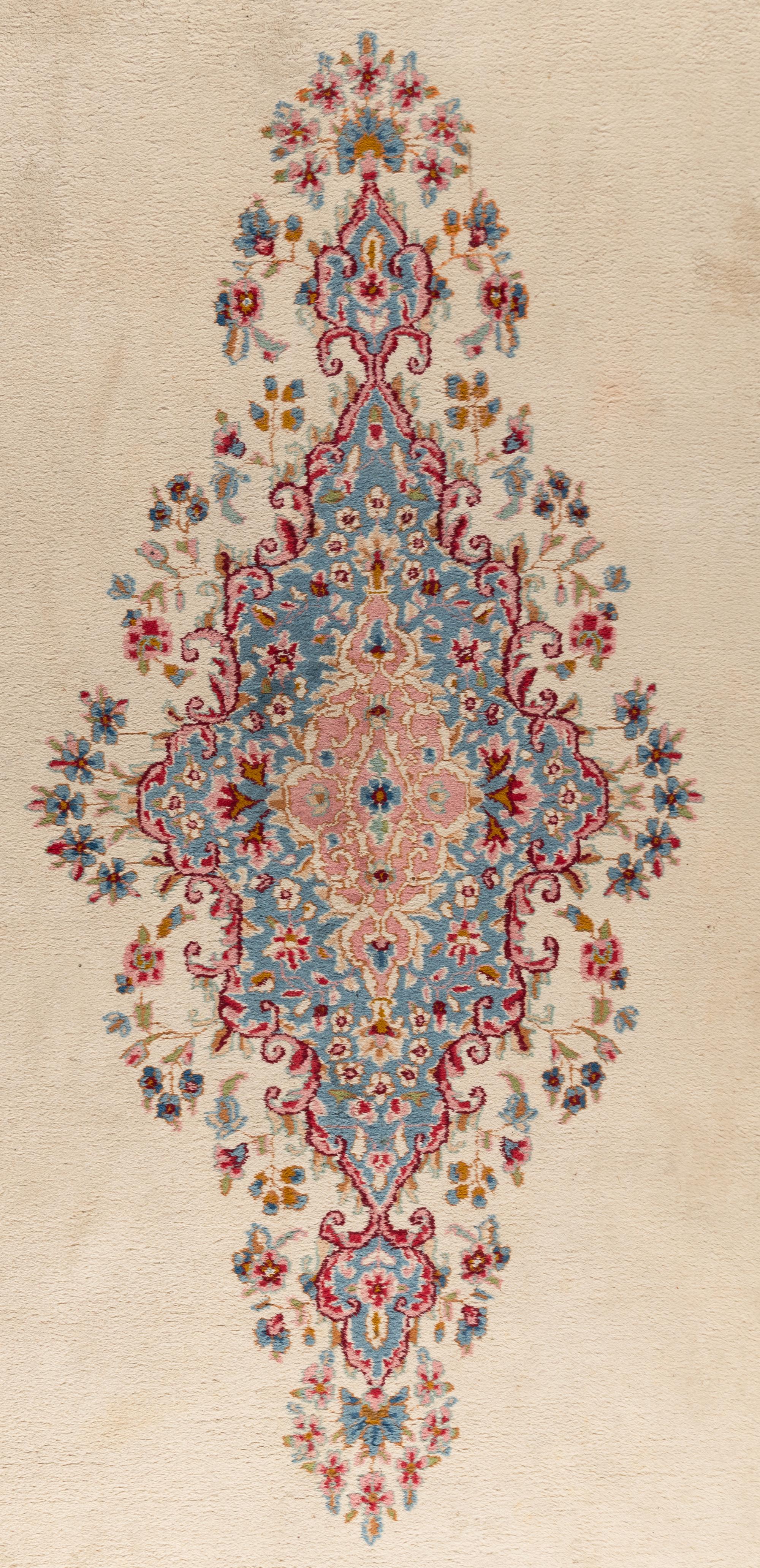 A Kerman Wool Rug