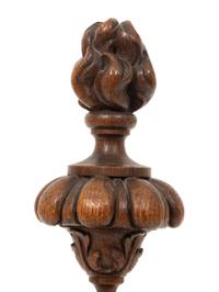 A Carved Oak Flaming Urn Finial Mounted on a Pedestal Base