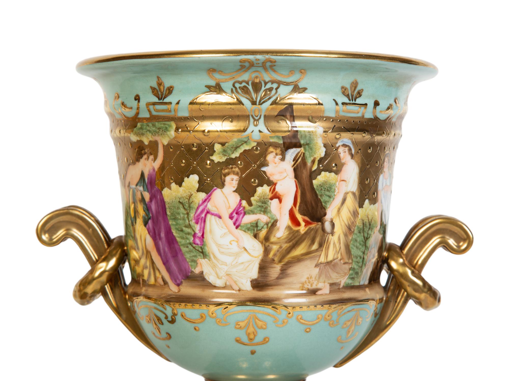 A Pair of Vienna Porcelain Urns with Classical Scenes
