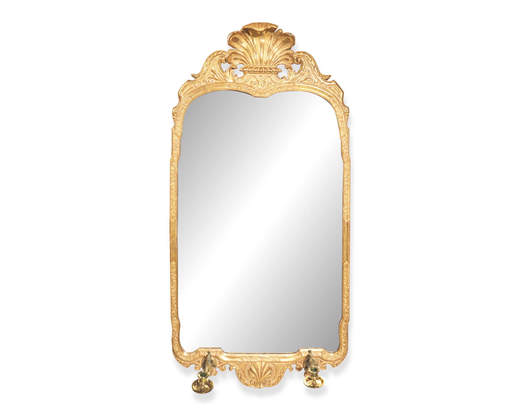 A George I giltwood and gesso looking glass, early 18th century