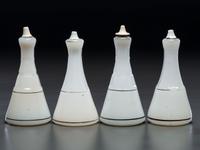 Four Milk Glass Barber Bottles with Ceramic Stoppers