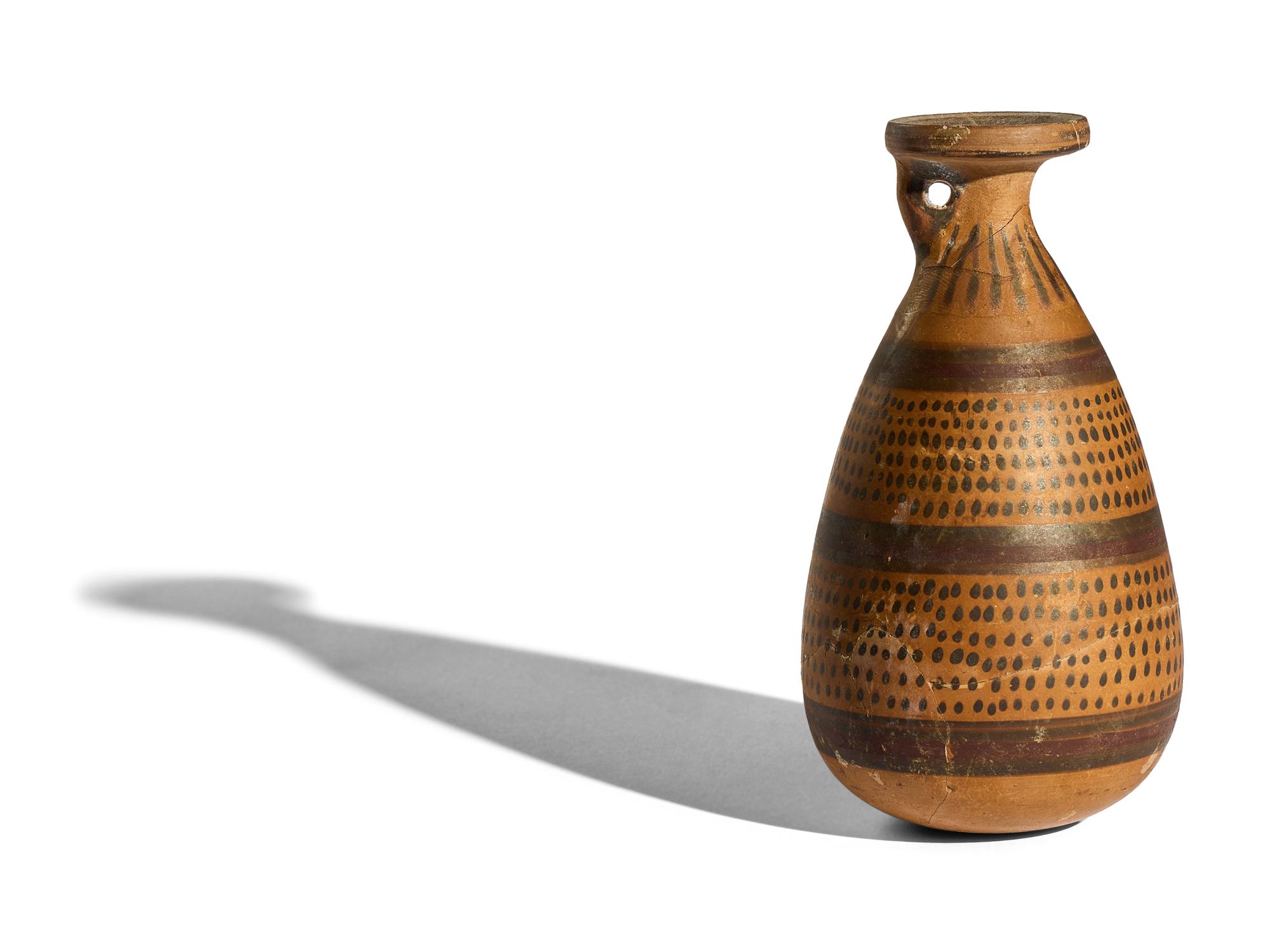A Greek Potter Alabastron