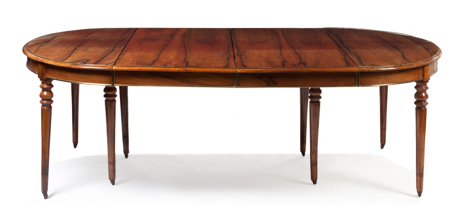 A Louis Philippe Black Walnut Extension Dining Table, Height 30 x width 188 x depth 56 1/2 inches (closed).