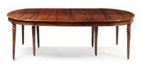 A Louis Philippe Black Walnut Extension Dining Table, Height 30 x width 188 x depth 56 1/2 inches (closed).