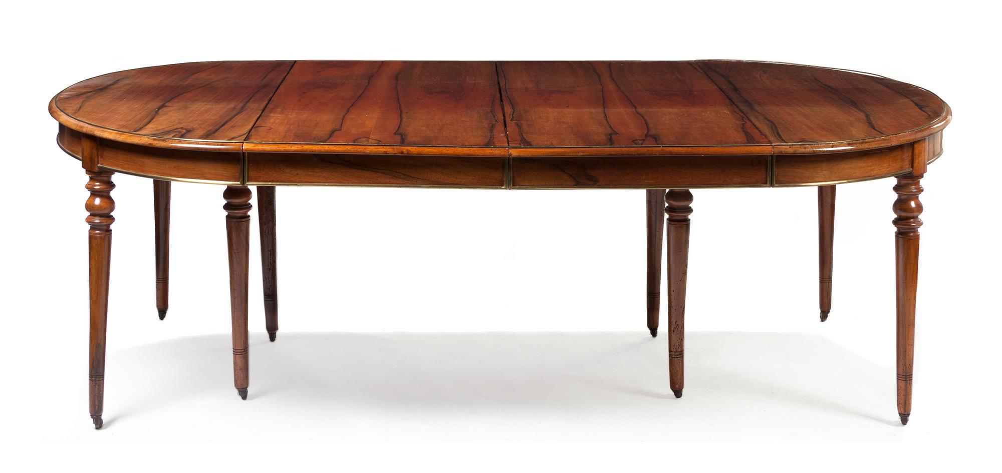 A Louis Philippe Black Walnut Extension Dining Table, Height 30 x width 188 x depth 56 1/2 inches (closed).