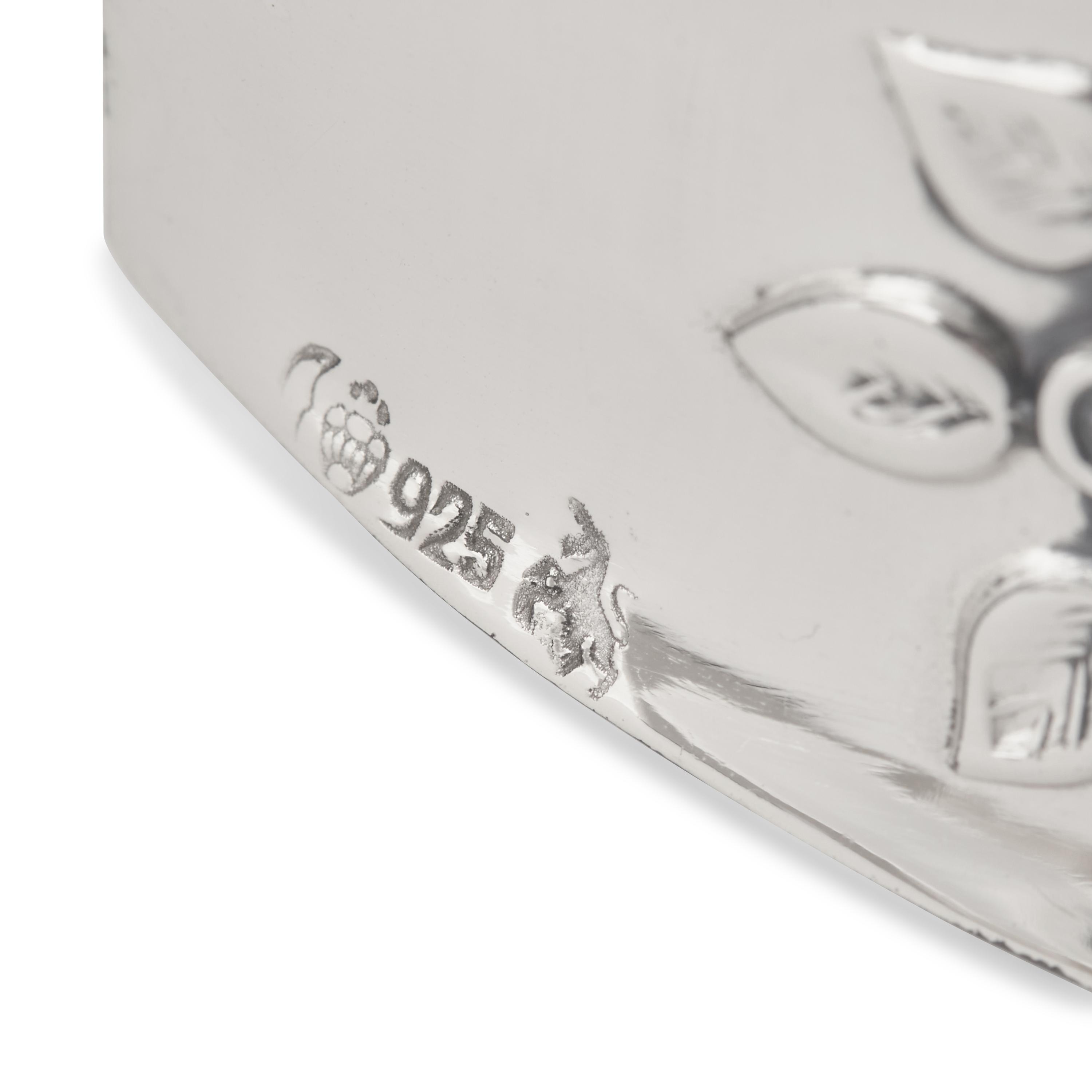 A Set of Twelve German Silver Napkin Rings