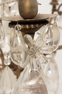 A French Gilt Metal and Cut Glass Eight-Light Chandelier
