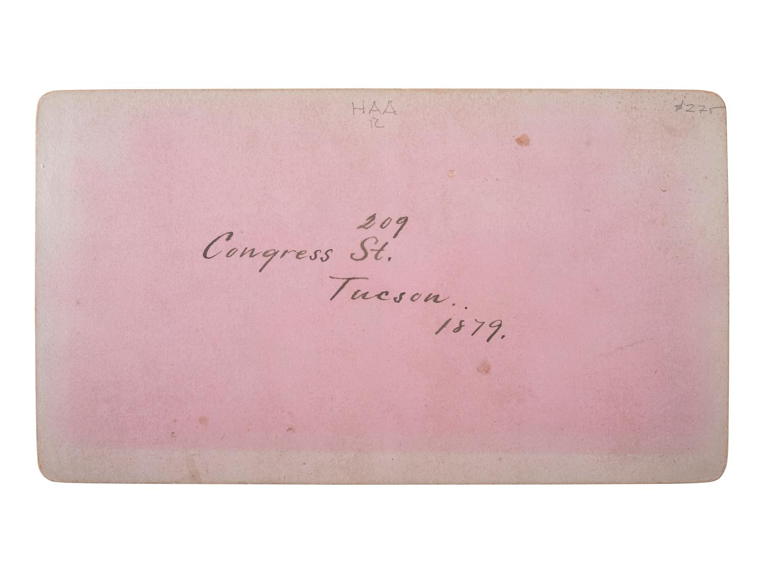 [WESTERN AMERICANA - ARIZONA]. BUEHMAN, Henry (1851-1912), photographer. A group of 2 stereoviews of Tucson, incl. view of Congress Street and horse-drawn ore cart passing through town. Tucson, Arizona Territory, ca 1870s.