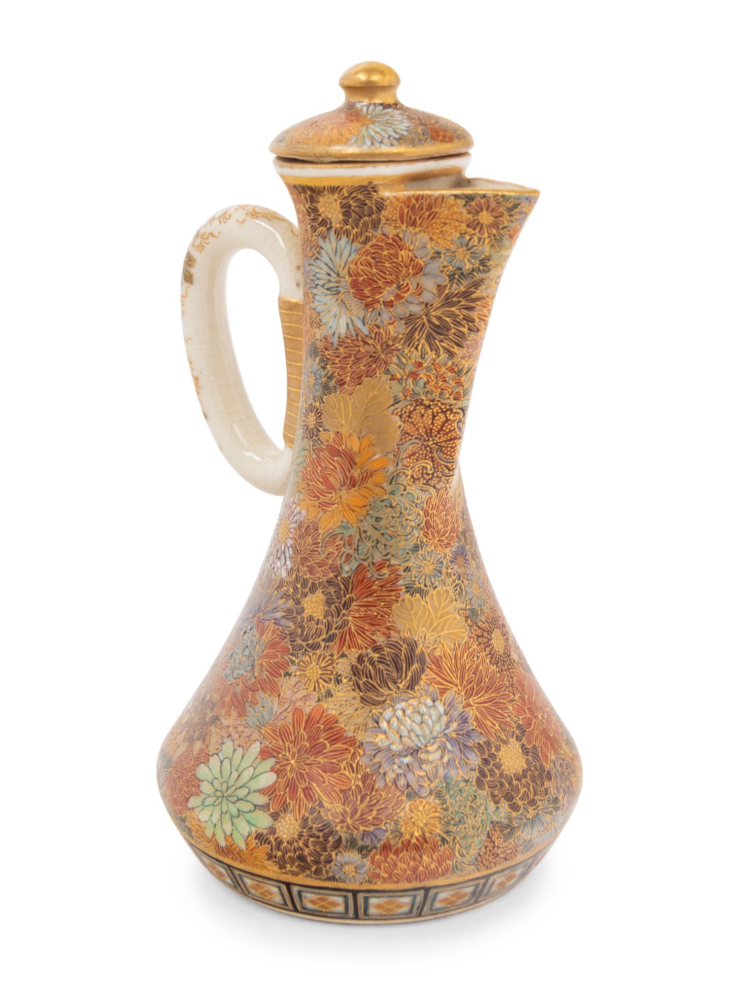 A Small Japanese Satsuma 'Millefleur' Covered Ewer