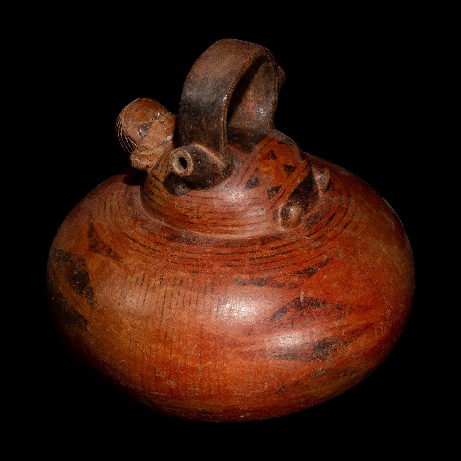 A Calima Redware Anthropomorphic Alcarraza