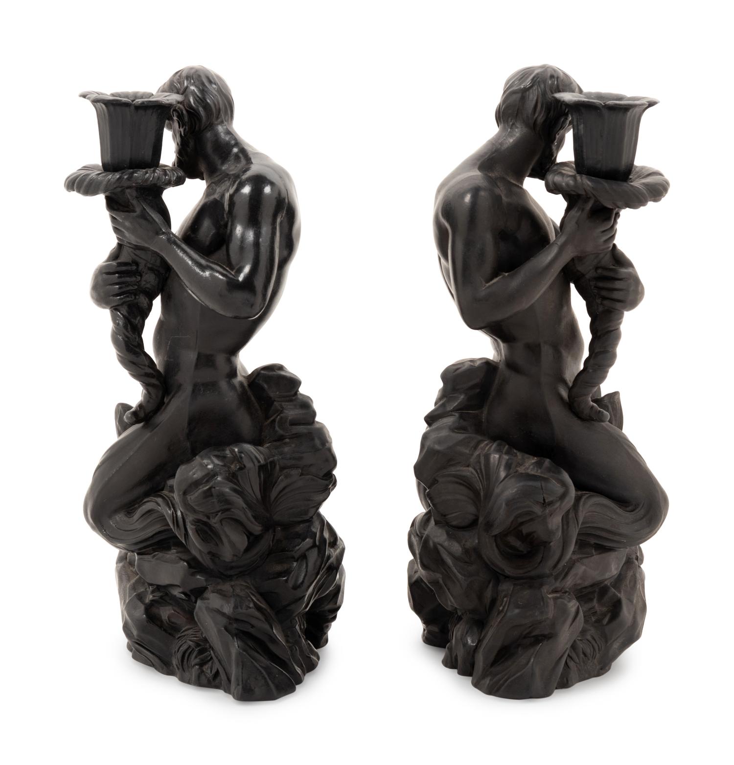 A Pair of Wedgwood Black Basalt Triton Candlesticks
