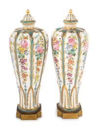 A Pair of Sèvres Style Porcelain Covered Vases