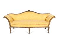 An Italian Rococo Silvered and Gilt Walnut Sofa