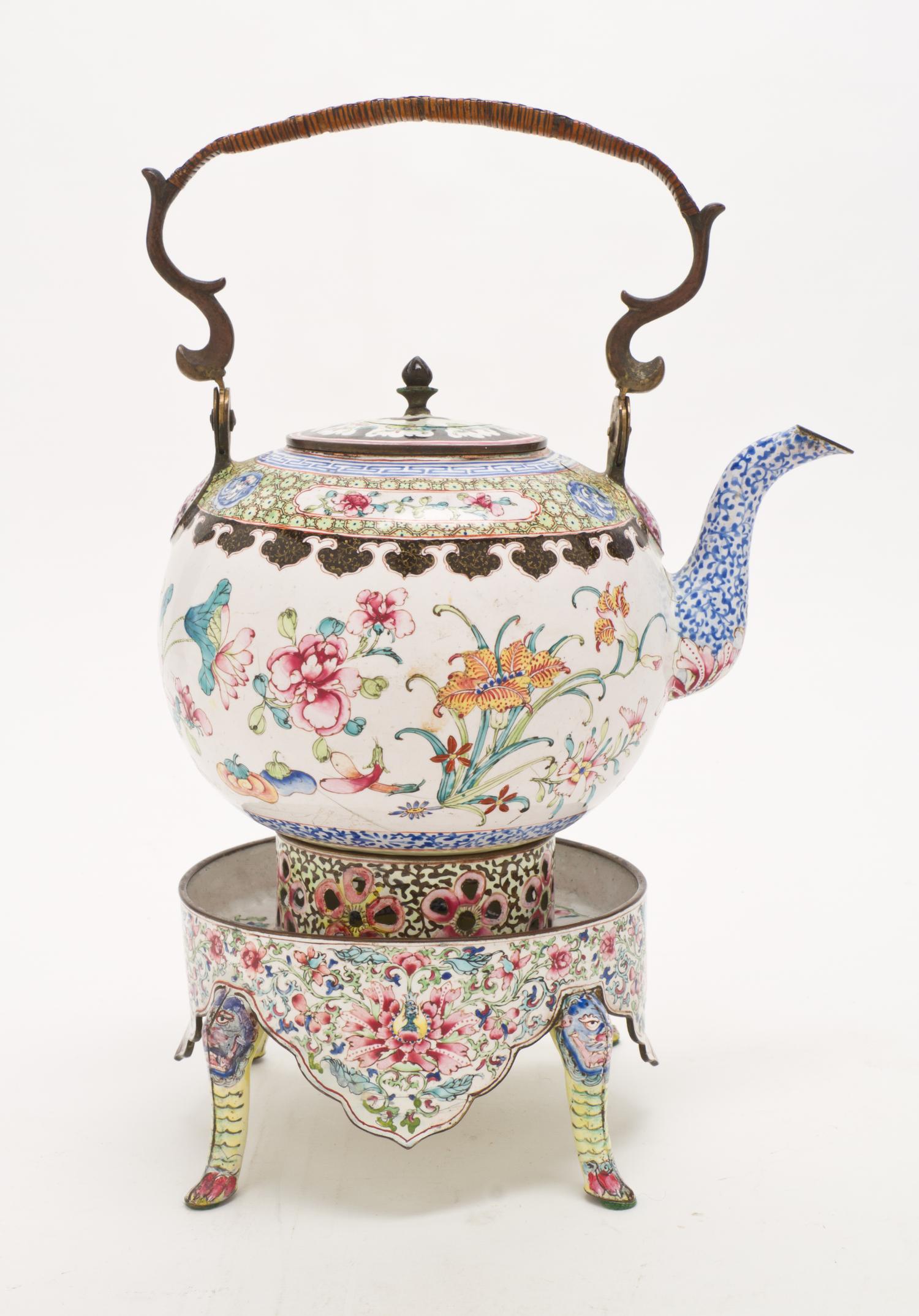 A Canton Enamel Teapot on Warming Stand, Height over handle 11 1/2 inches.