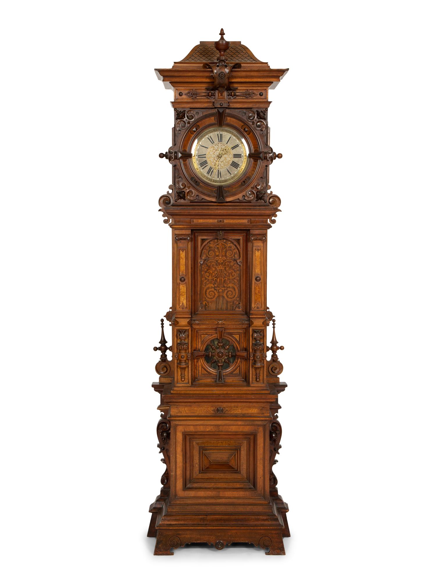 A German Carved Walnut and Marquetry Tall Case Clock