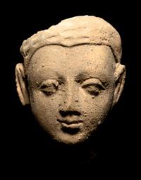 Three Gandharan Fragmentary Stucco Heads and One European Fragmentary Stucco Head