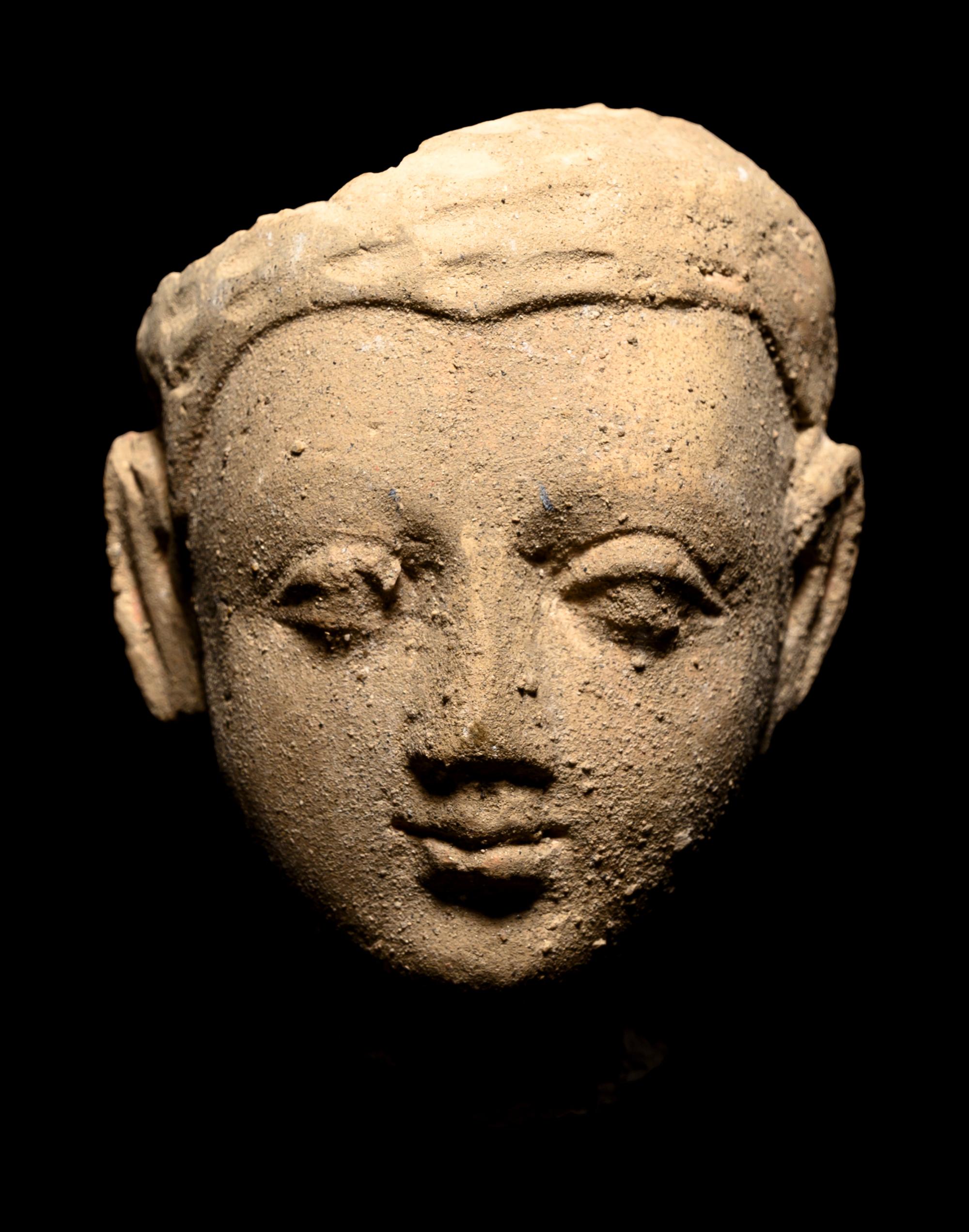 Three Gandharan Fragmentary Stucco Heads and One European Fragmentary Stucco Head
