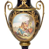 A Pair of Sèvres Style Porcelain Urns