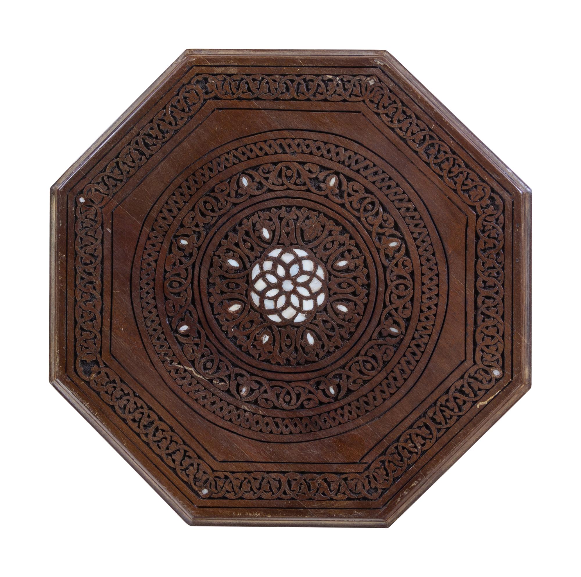 A Moorish Style Mother-of-Pearl Inlaid Carved Walnut Table