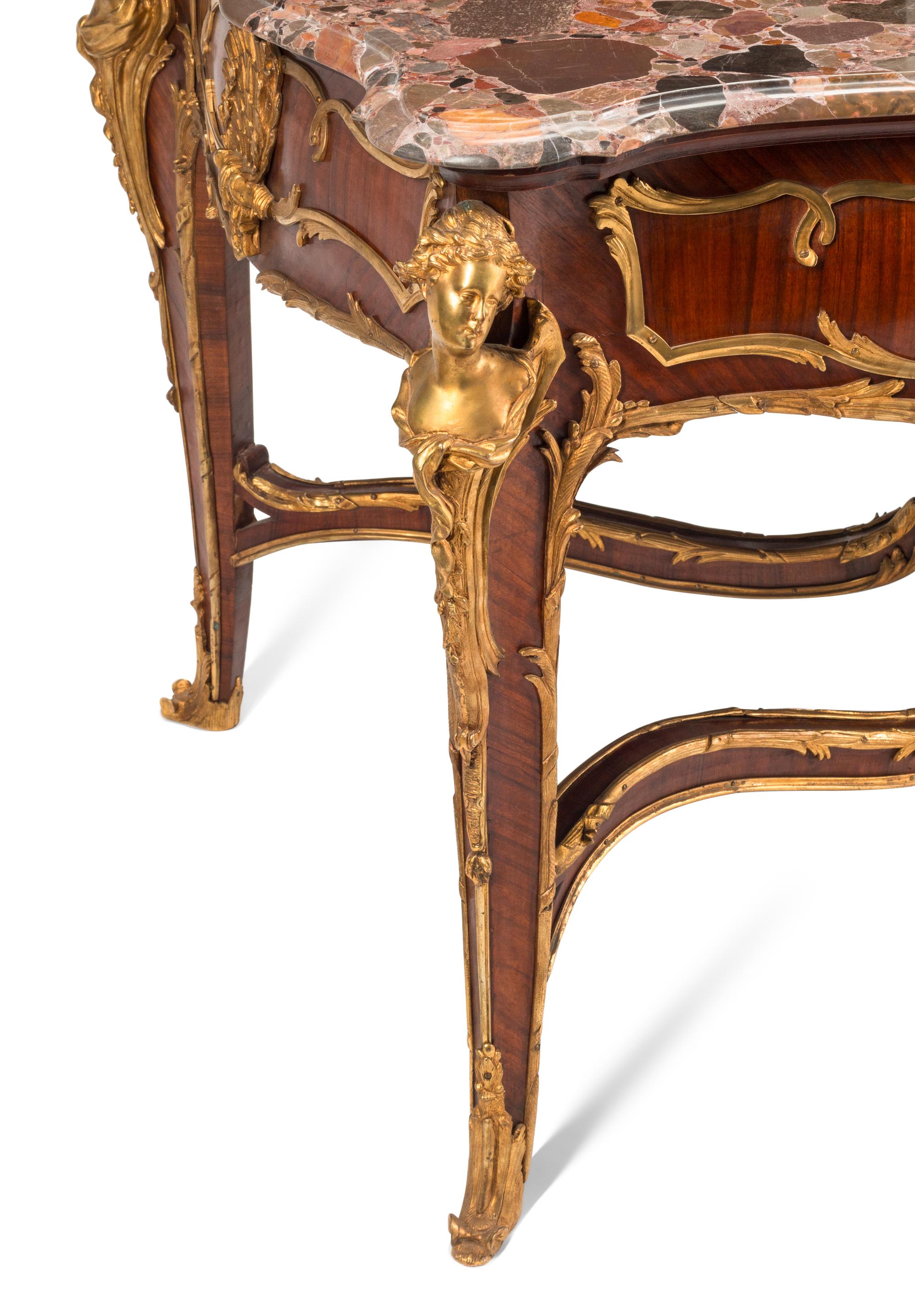 A Louis XV Style Gilt Bronze Mounted Mahogany Marble-Top Salon Table