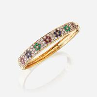 An eighteen karat gold and gem-set bangle, Van Cleef & Arpels