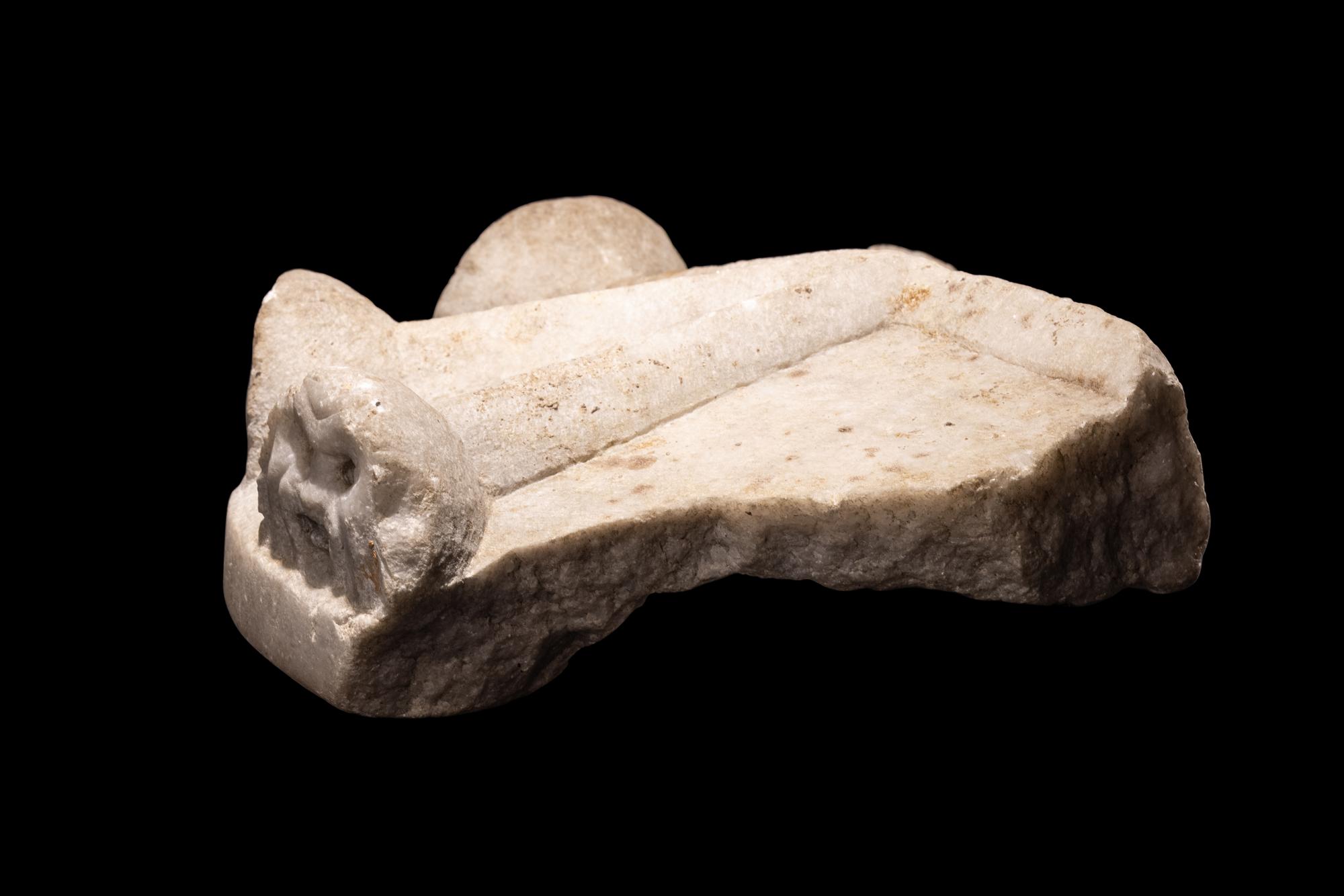 A Roman Marble Cinerarium Fragment