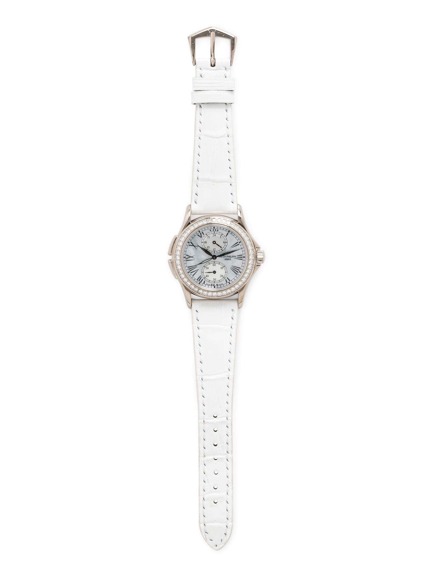 PATEK PHILIPPE, REF. 4934G 18K WHITE GOLD, MOTHER-OF-PEARL AND DIAMOND 'CALATRAVA' 'TRAVEL TIME' WATCH, WITH PATEK EXTRACT