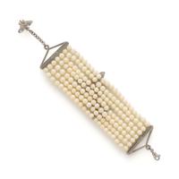 Chantecler, White Coral, Diamond, and Bicolor Gold Dragonfly Bracelet