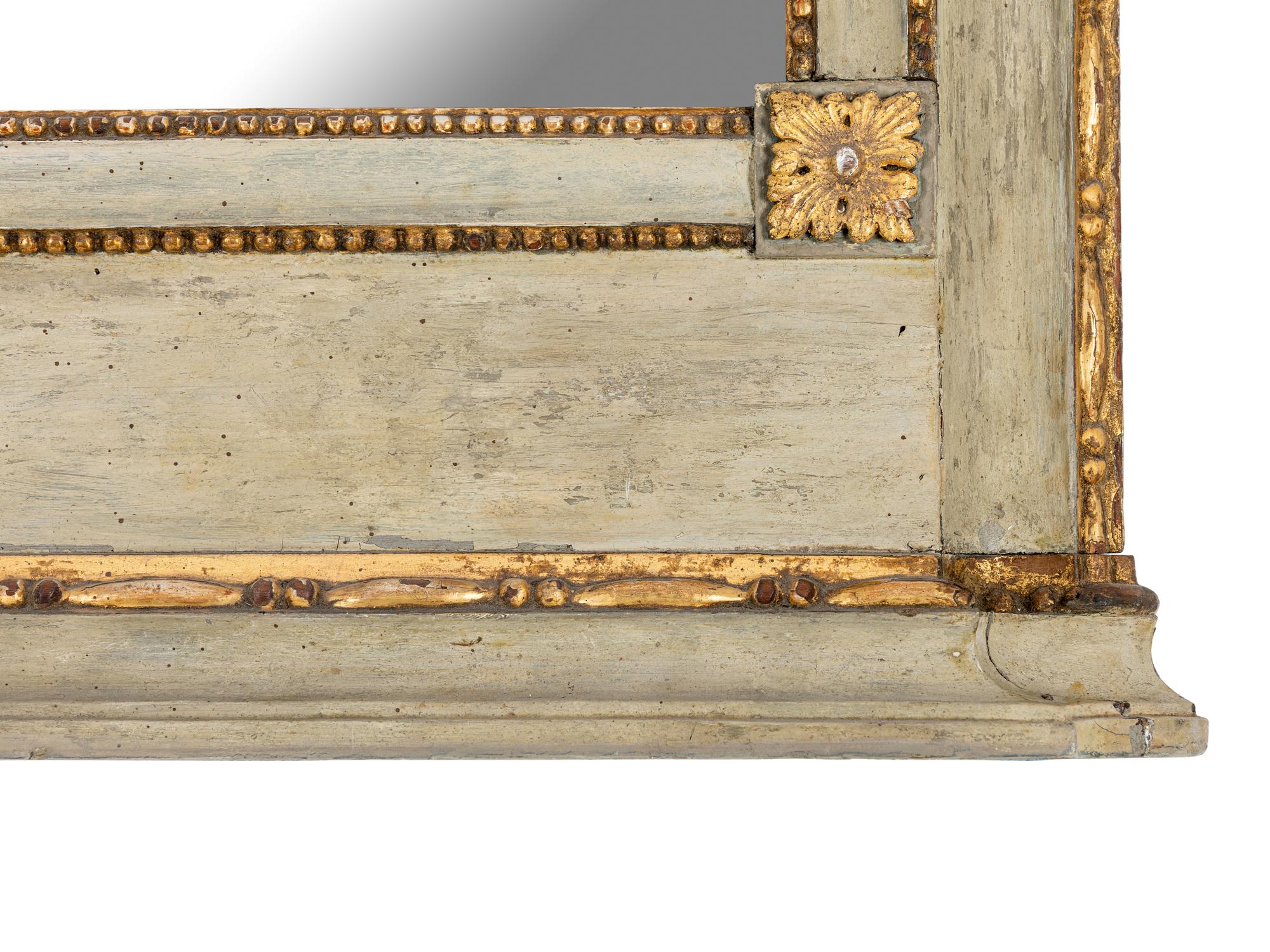 A French Provincial Green-Painted and Parcel-Gilt Mirror