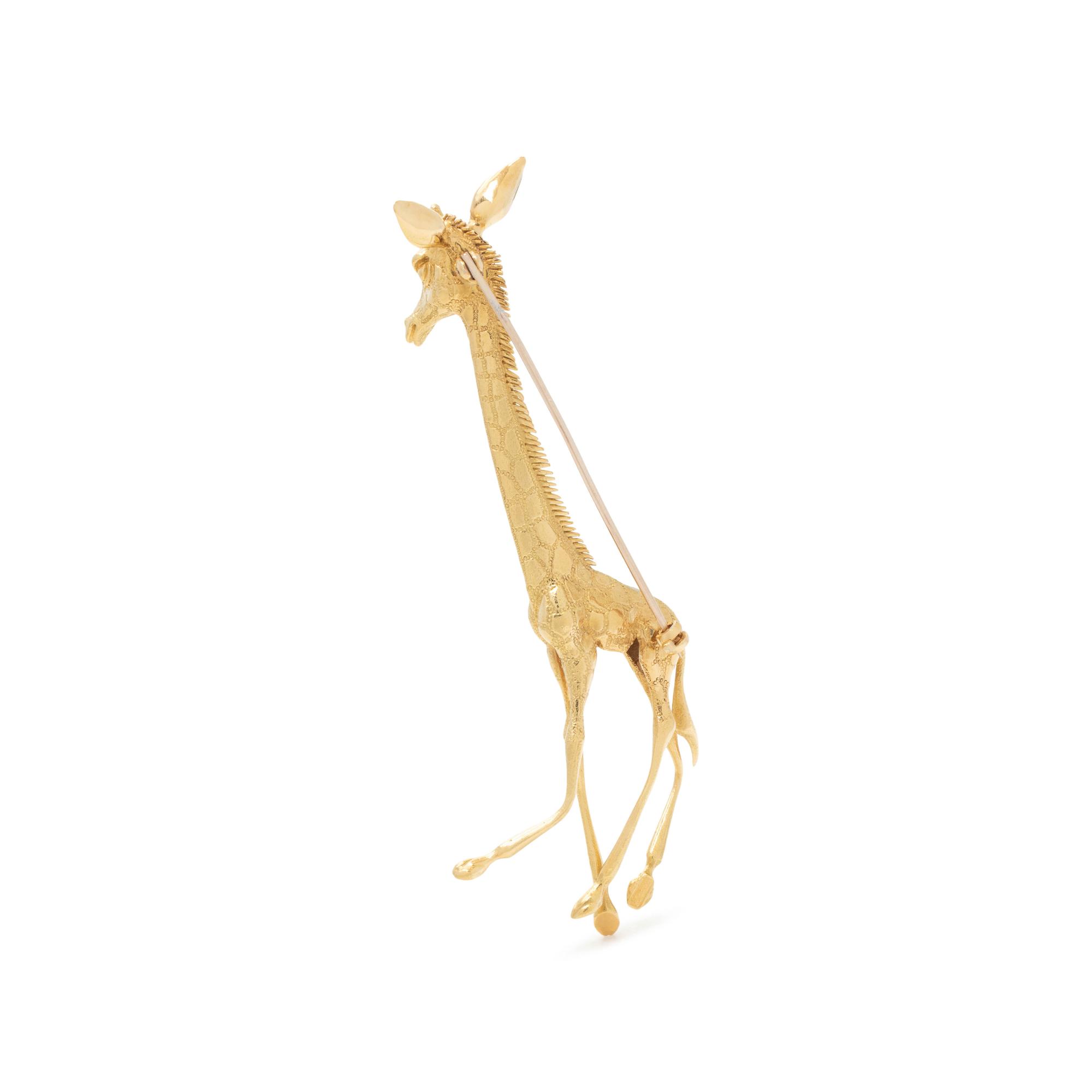 KUTCHINSKY, YELLOW GOLD GIRAFFE BROOCH