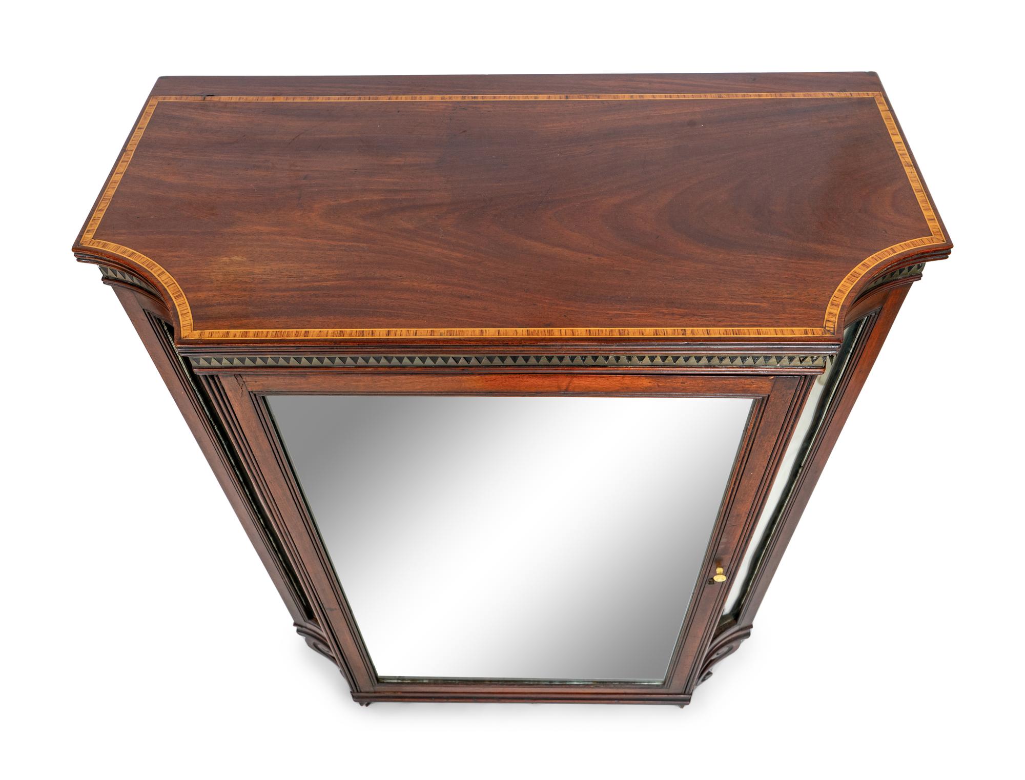 A Pair of Late Regency Brass and Satinwood-Inlaid Mahogany Cabinets