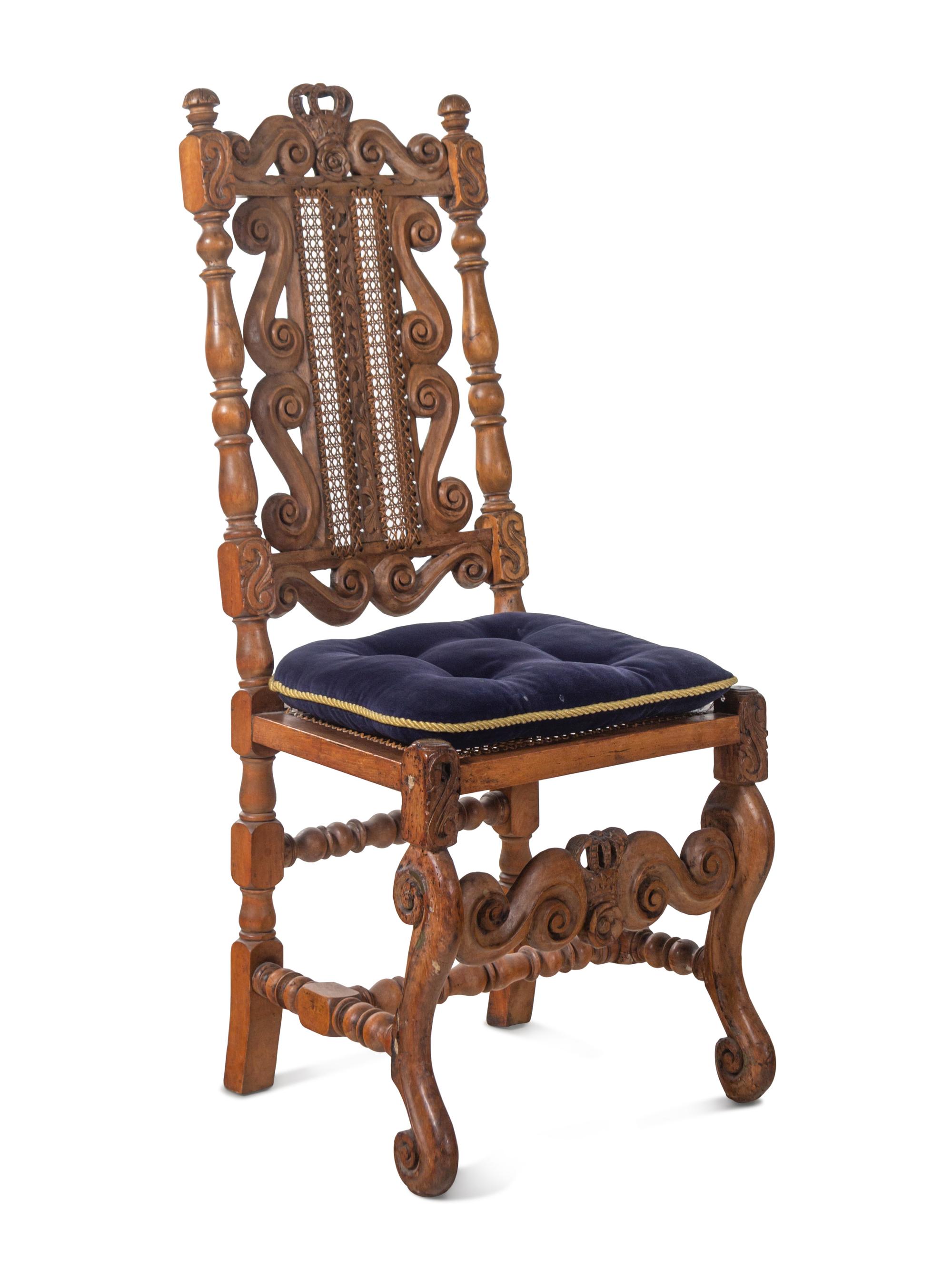 An Assembled Set of Eight English Baroque Walnut Cane-Upholstered Dining Chairs