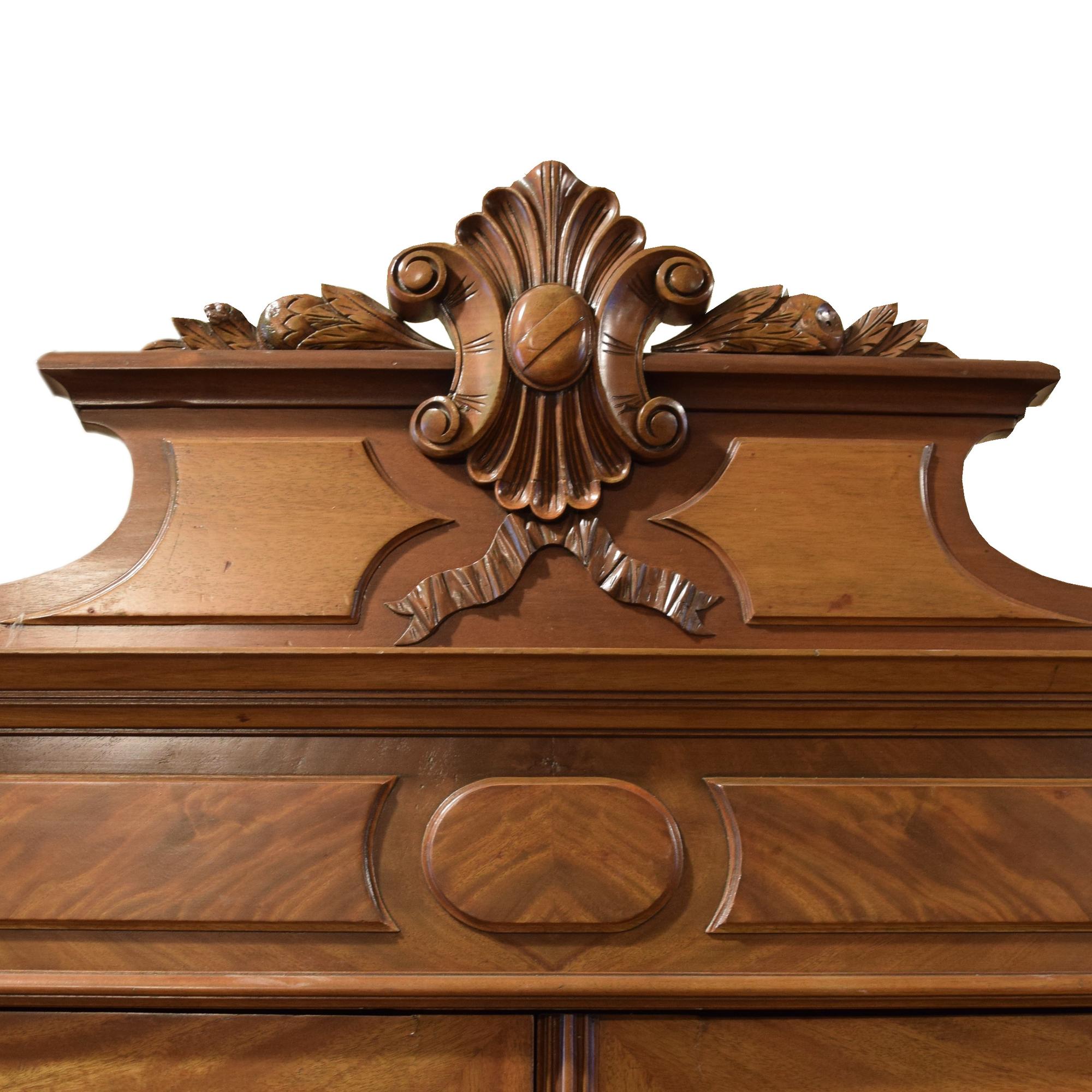 A Victorian Walnut Two Door Armoire 52" W x 22" D x 83" H — United States, Circa 1880