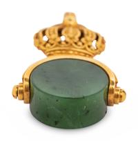 A Russian Yellow Gold and Carved Nephrite Swivel Seal