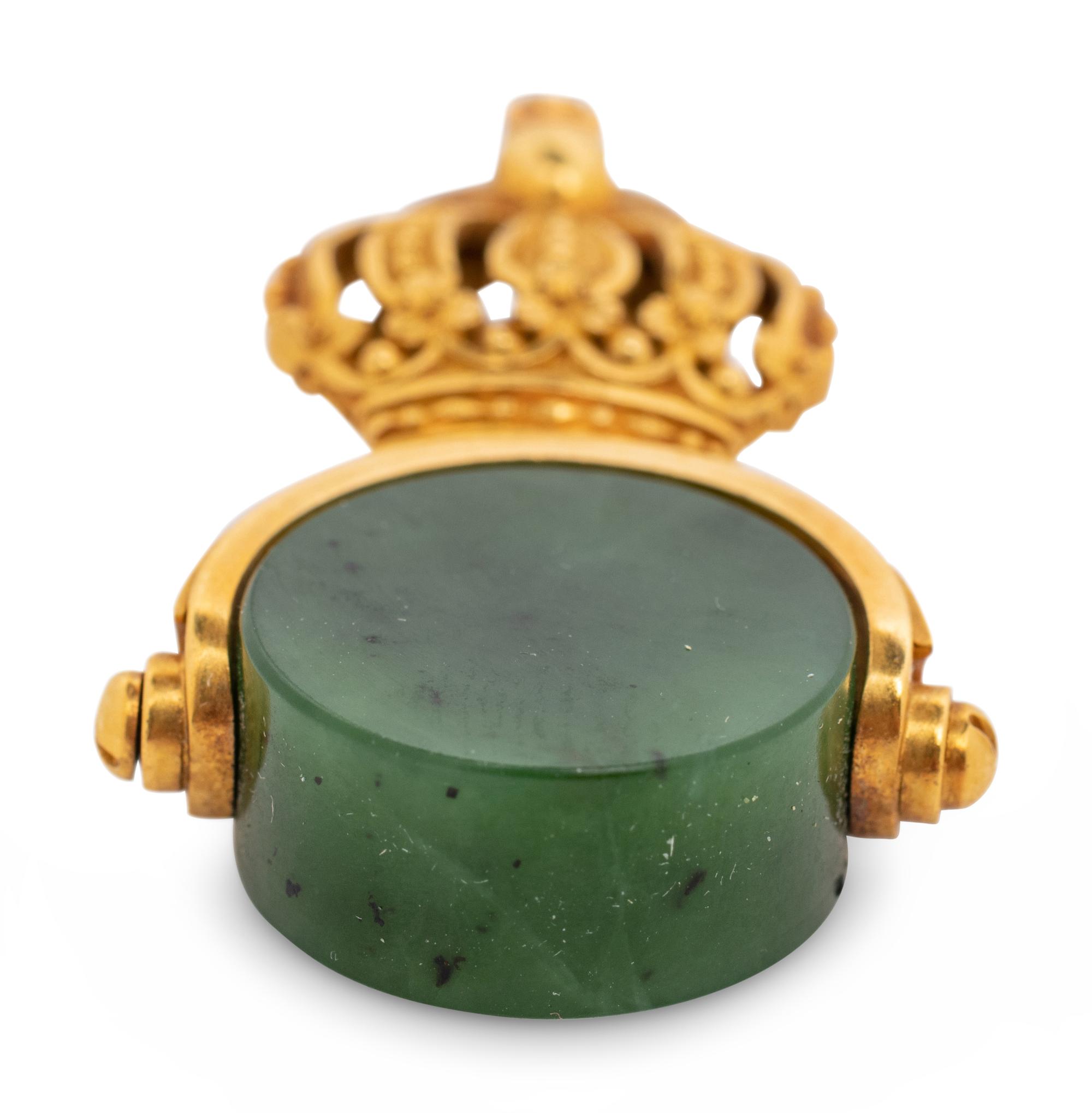 A Russian Yellow Gold and Carved Nephrite Swivel Seal