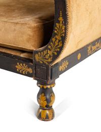 An Empire Ebonized and Parcel Gilt Daybed