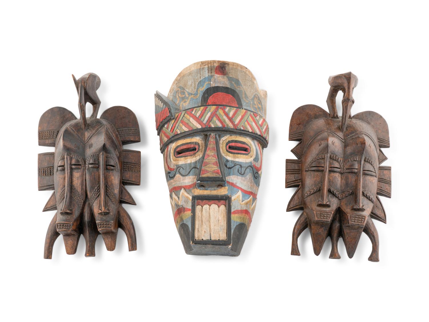 A Group of Three West African Carved Masks