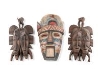 A Group of Three West African Carved Masks