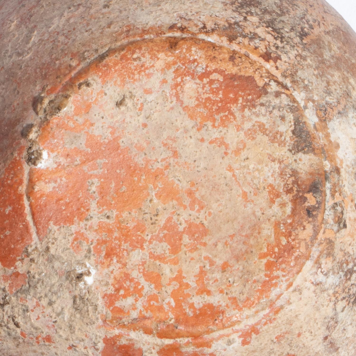A Roman Terracotta Lamp with Symplegma Scene