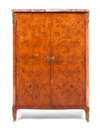 A Louis XV Style Marquetry and Bookmatch Veneered Linen Press, Height 47 3/8 x width 37 3/4 x depth 17 1/2.