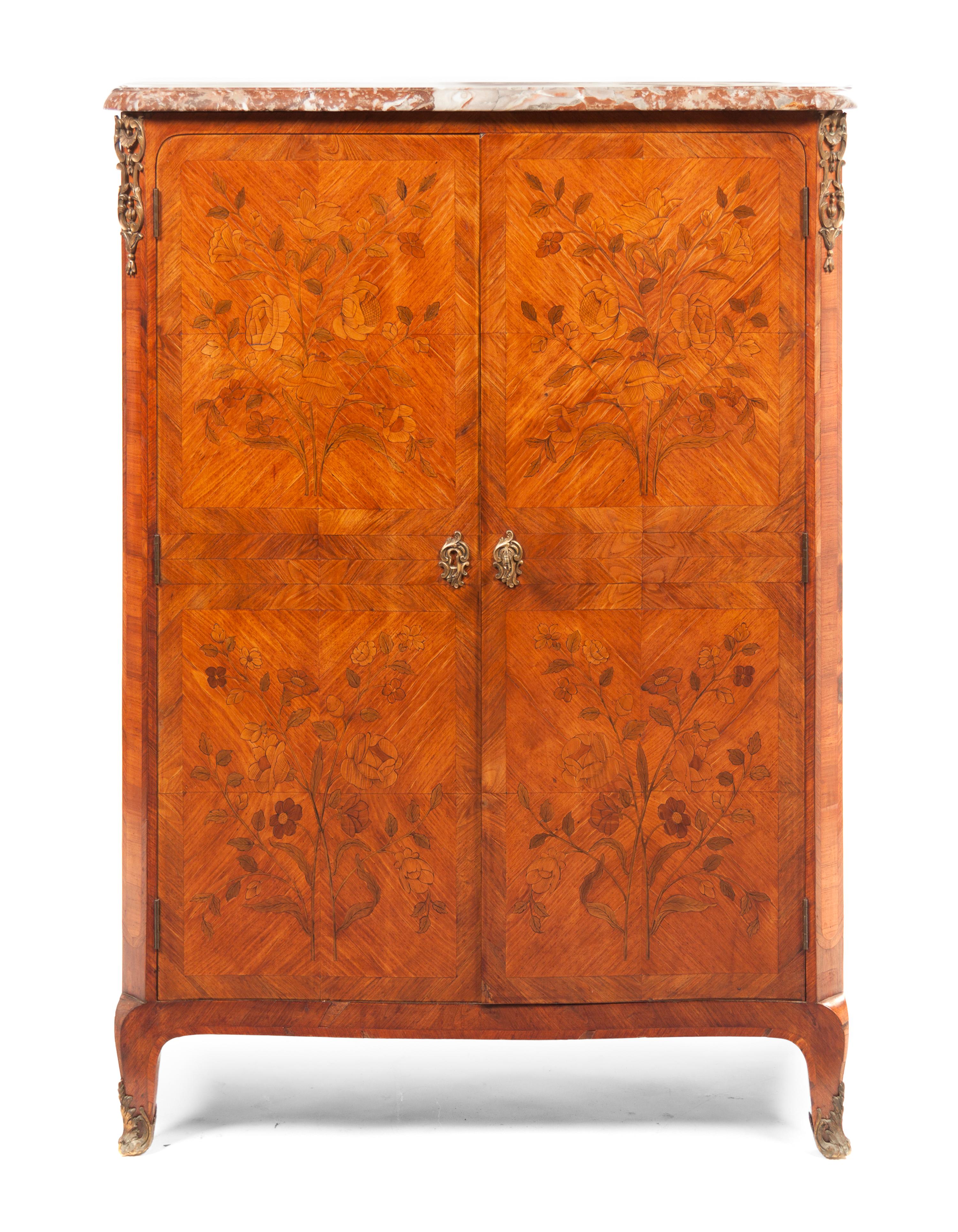 A Louis XV Style Marquetry and Bookmatch Veneered Linen Press, Height 47 3/8 x width 37 3/4 x depth 17 1/2.