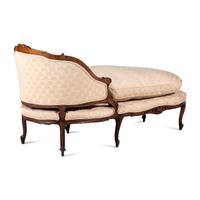 A Louis XV Style Carved Walnut Chaise Lounge