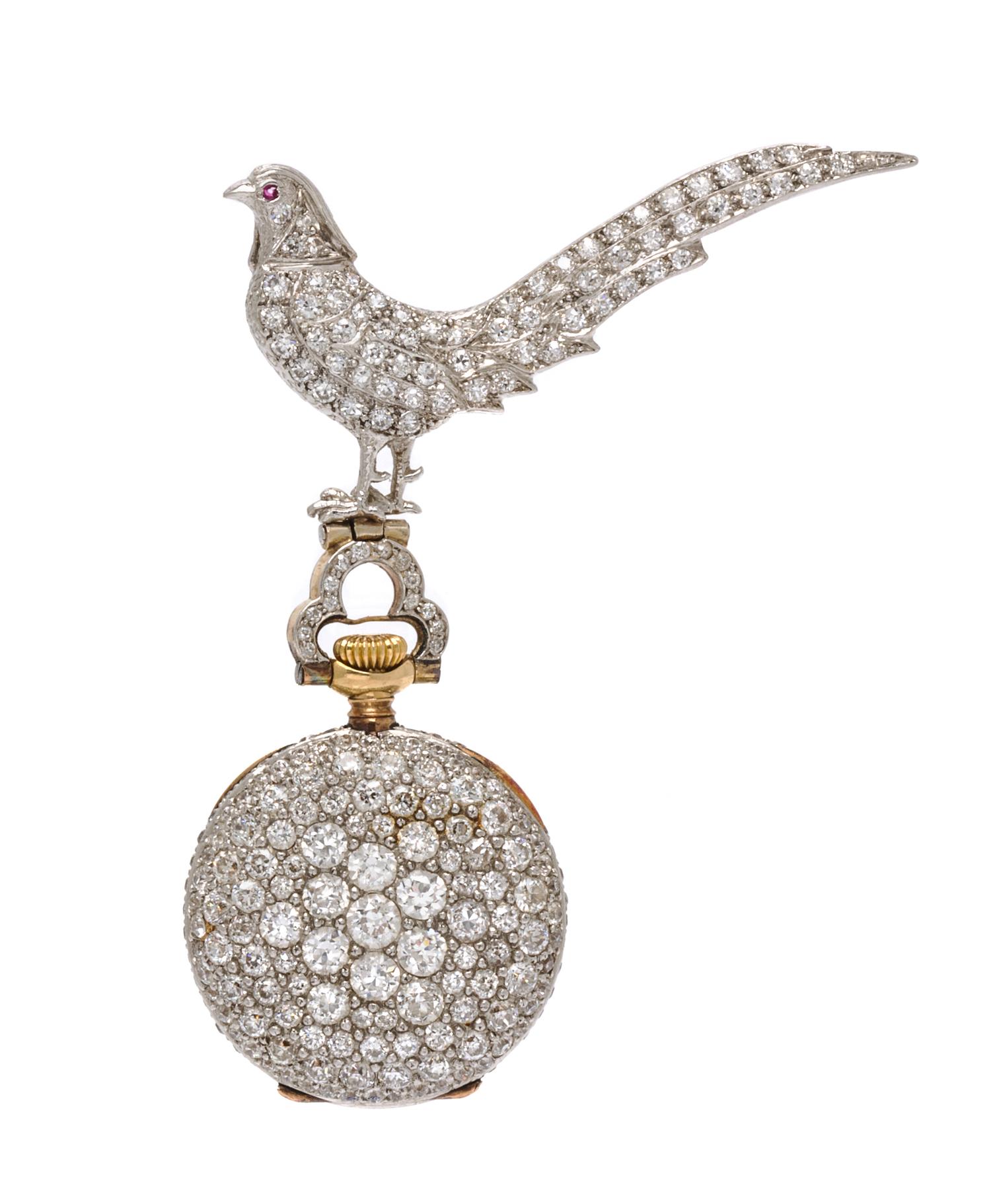 A Platinum, Diamond, Ruby and Yellow Gold Open Face Lapel Watch, Tiffany & Co.,