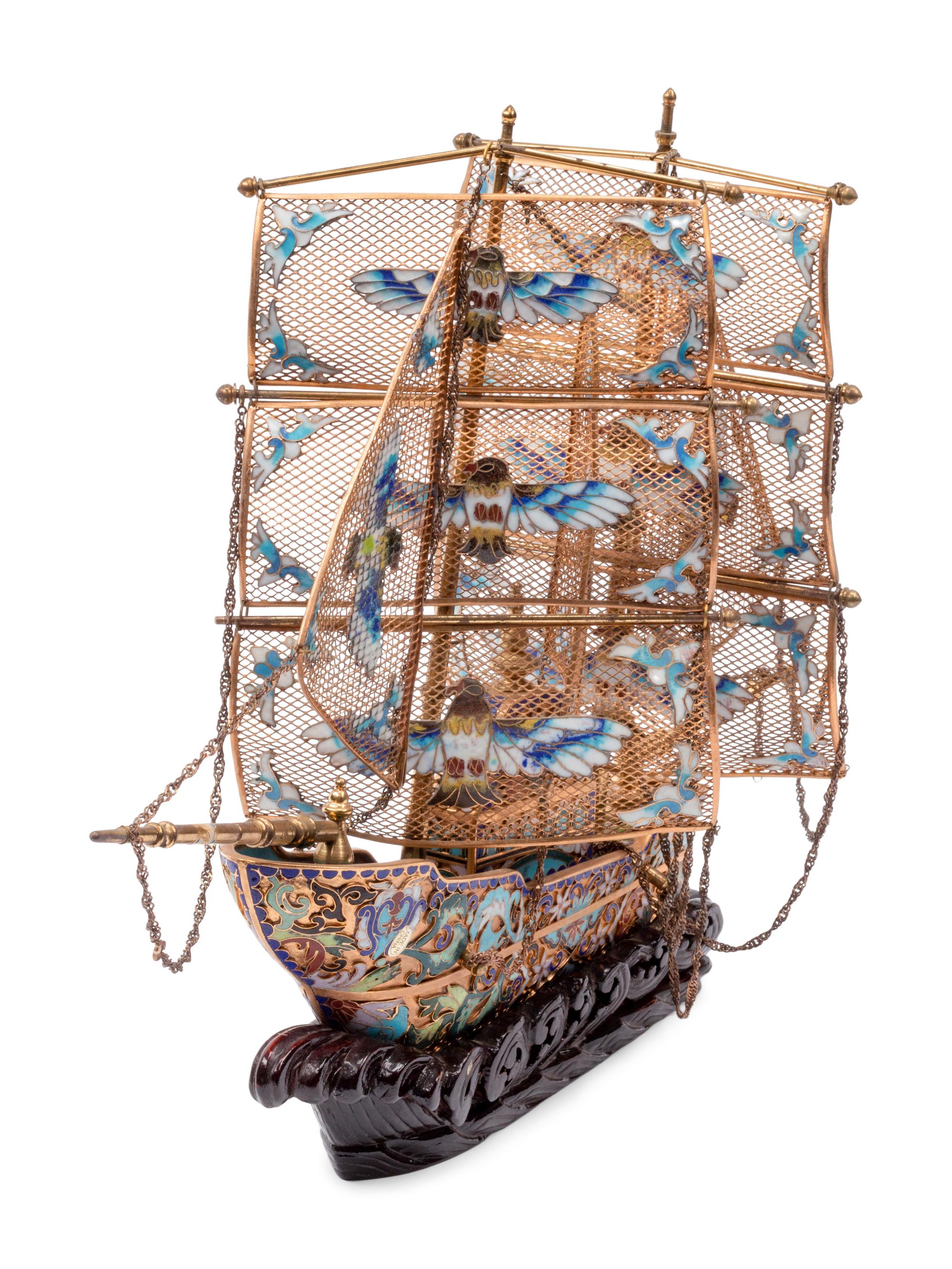 A Chinese Export Enameled Gilt Metal Model of a Ship