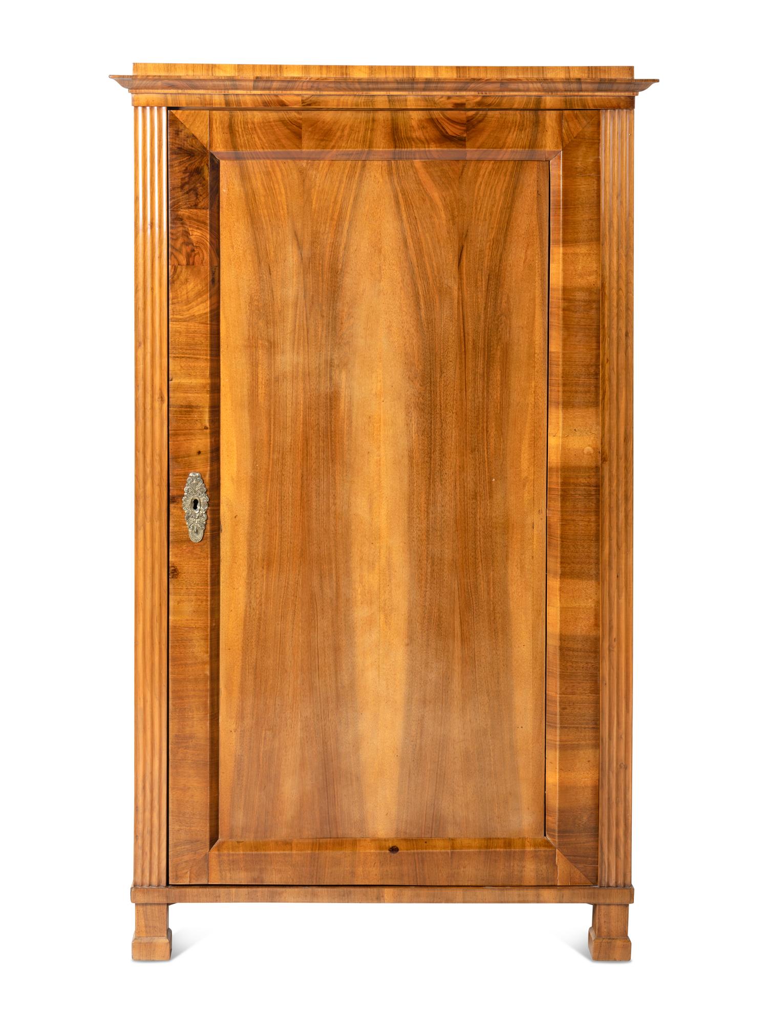 A Biedermeier Birch Armoire